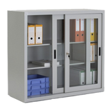 Armoire à portes coulissantes transparentes fermée, offrant un rangement moderne et élégant.